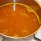 Turmeric and salt are added to the boiling water for the rice
