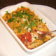 Tucking in to plaice fish and pasta bake