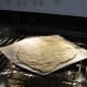 Bake in a preheated oven on the stone