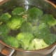 Broccoli is simmered in boiling salted water