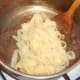 Tagliatelle pasta is carefully stirred through beef and red wine sauce