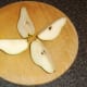 Pear is quartered down through the centre
