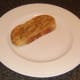 Bruschetta slice is plated
