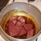 Browning venison in oil and spices