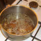 Simmering venison in beef stock