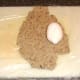 Duck egg laid on rolled haggis