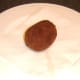 Haggis Scotch duck egg is drained on kitchen paper