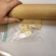4. Optional: Add cracker crumbs to make cookies hold up better. Crush crackers in Zip lock bag with rolling pin.