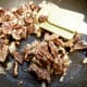 Candied pecans are done when all the sugar is melted and candied on the pecans.