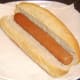 Hot dog is added to sub roll