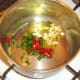 Frying off spices for bean chilli