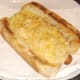 Crispy cheese and breadcrumb coated mac and cheese dog
