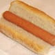 Hot dog is placed in sub roll