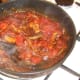 Tomatoes are stirred through spicy onions and mushrooms