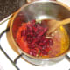 Tomatoes and beans are added to fried off spices