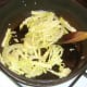 Sauteeing cabbage, onion and garlic