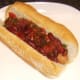 Bean chilli is spooned on to dog