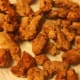Drain excess oil in a tissue paper