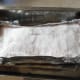 The pork rind is now covered with a layer a salt. Make sure the salt does not go over the sides of the meat, otherwise it will be rather salty!