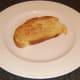 Toast is laid on a serving plate.