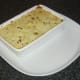 Browned cottage pie is plated