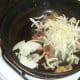 Cabbage and onion added to stir frying ox kidneys