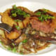 Tucking in to corned beef fritters with stir fried cabbage and kidneys