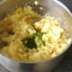 Chopped chives are added to mashed tatties and neeps