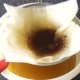 Burned breadcrumbs and other impurities removed from oil