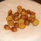 Draining pan roasted potatoes