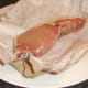 Unwrapping back bacon steak