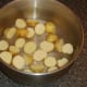 New potato halves ready to be boiled as first stage of cooking