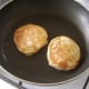 Christmas pudding pancakes are turned