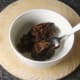 Christmas pudding is heated in microwave oven