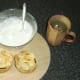 Starting to ice Christmas pudding pies