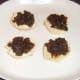 Christmas pudding spread on sultana scones