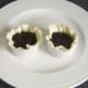 Christmas pudding is cooled and carefully spooned in to pie cases
