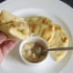 Spicy jellied conger eel is spooned on to naan bread