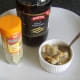 Seasoning jellied conger eel and cockles with malt vinegar and white pepper