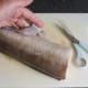 Trimming fins from conger portion