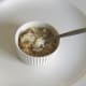 Jellied conger eel and cockles enjoyed simply with malt vinegar and white pepper seasoning
