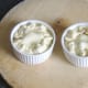 Puff pastry pies are crimped and glazed