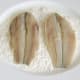 Herring fillets are patted in seasoned flour