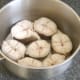 Blanched conger eel steaks are added to poaching pot