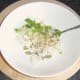 Combining and seasoning conger eel, onion and parsley