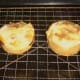 Puff pastry steak pies are rested on wire rack