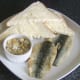 Jellied conger eel and cockles with pan fried herring fillets and bread and butter