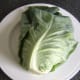 A whole sweetheart or pointed cabbage.