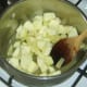 Starting to cook apple and pineapple sauce
