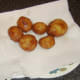 Potatoes are drained on kitchen paper